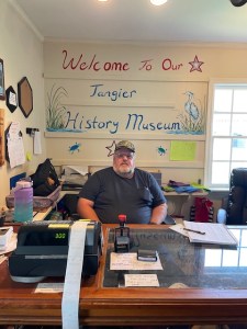 man sitting at museum